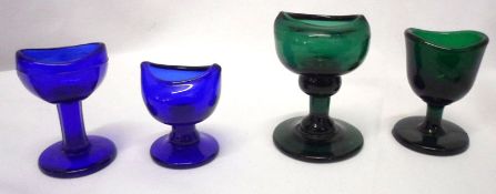 A collection of twelve assorted 19th and early 20th Century Blue and Green Glass Eye Baths, of