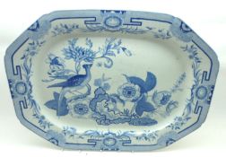 A large 19th Century octagonal blue and white Meat Plate, decorated with tropical bird amongst