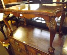 A 20th Century Walnut Queen Anne style serpentined Coffee Table, raised on four cabriole legs with