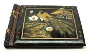 A Vintage Rectangular Oriental Lacquered Photograph Album, the front decorated with peacock