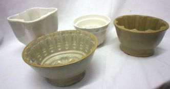 A collection of four various assorted Pottery Jelly Moulds, largest 6” high
