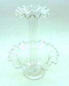 A late 19th Century Clear Glass Single Stem Epergne Vase with frilled edges, raised on a round foot,