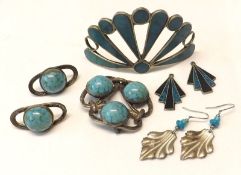 A group comprising a Mexican white metal and enamelled pair of Earrings of fan design in Art Deco