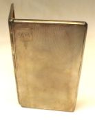 A large Rectangular Cigarette Case, the front with engine-turned detail and small cartouche