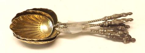 A Set of five late Victorian Apostle Spoons, of typical form, twisted stems and shell-shaped