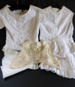 A collection of Victorian Undergarments and Dress Fronts comprising of two White Cotton Twill