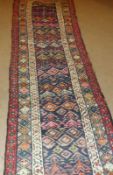 An early 20th Century Caucasian Wool Runner, triple gull border, central panel of tree of life