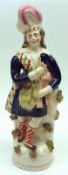 A 19th Century Staffordshire Figure of a Scotsman, decorated throughout in colours, mounted on a