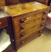 An early Victorian Mahogany Chest of four graduated full length drawers, fitted with turned knob