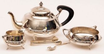 A George V Three Piece Tea Service, comprising squat Teapot with hinged lid and pointed finial, body