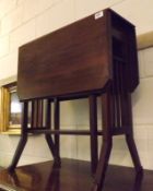 An early 20th Century Mahogany Sutherland style Gateleg Table with slatted ends and splayed legs,