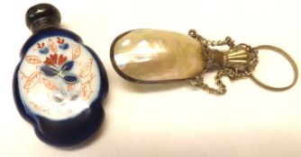 A Mixed Lot: a small Mother-of-Pearl Chain-mounted Scent Bottle with crown-shaped stopper;