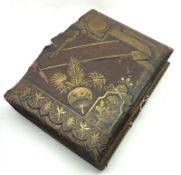 A Void Victorian Photograph Album, the leaves decorated with various coloured designs of foliage,