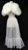A Vintage White Maribu Feather Caplet, together with a full length double layered net lace