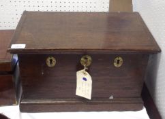 An Oak Document Box of rectangular form, the front with three locks on a plinth base, 18th/19th