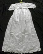A collection of  Baby Gowns and Dresses, to include Christening type Gown, Cream Wool Coat and a