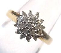 A hallmarked 9ct Gold Diamond Cluster Ring