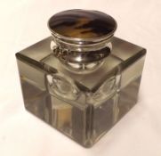 An early 20th Century Asprey of London Inkwell, the round tortoiseshell top to a London hallmarked