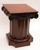 A pair of unusual Eastern Mahogany Pedestal Bedside Cabinets fitted with square lift off tops, to