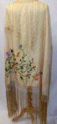 An early 20th Century Cream Silk Piano Shawl, embroidered with flower and foliate decoration,