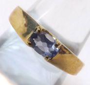 A hallmarked 9ct Gold Ring set with a solitaire Iolite