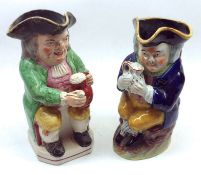 Two 19th Century Staffordshire Toby Jugs, modelled as portly seated topers, decorated in colours, (