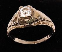A White Gold Solitaire Diamond Ring marked 18K