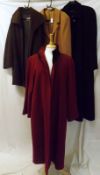 A Black Wool and Cashmere Ladies Full Length Coat; Huberman Red Wool Coat with faux fur collar;
