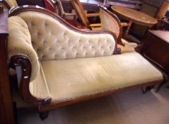 A Mahogany Chaise Longue, swept and moulded back and scrolled rest, torus moulded apron and raised