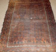 A Caucasian Carpet with multi-gull border, central geometric panel, mainly rust field (various holes