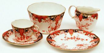 A 20th Century Crown Derby part Tea Service, comprising twelve Cups, twelve 7” Side Plates, two 9”