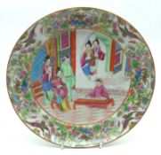 A 19th Century Canton Famille Rose Circular Plate, painted in typical colours with an interior scene