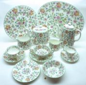 An extensive quantity of Minton Haddon Hall Tea and Dinner Ware, comprising fourteen 10 ½” Dinner