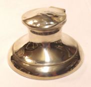 A 20th Century Capstan Inkwell of typical form, hinged lid opening to reveal and clear glass inkwell