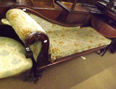 A Victorian Mahogany Chaise Longue, swept moulded and scrolled back over a moulded apron and