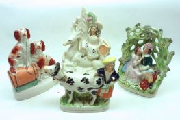 A Mixed Lot of 19th Century Staffordshire Figures: a Cream Jug modelled as cow and milkmaid; an