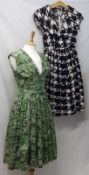 Two 1950s Cotton Day Dresses, comprising of a Black and White Print short sleeved Dress with large
