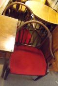 A pair of 19th Century Mahogany Tub Chairs, with ring turned spindle backs, cresting rails