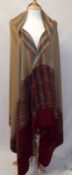 A 20th Century Wool Kashmiri type Paisley Shawl in traditional red/brown colours