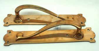 A pair of early 20th Century Heavy Brass Door Handles, 16” long