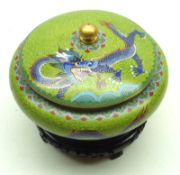 A Cloisonné Covered Jar of compressed circular baluster form, decorated with dragons and smoke