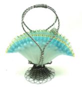 An unusual 20th Century Opaque Frilled Glass Table Decoration in woven wire-work silver-plated