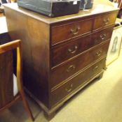 An early 19th Century Oak Chest, the top with moulded rim to two short and three full length drawers