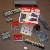 A box containing a quantity of OO Gauge Model Railway Building and assorted accessories, together