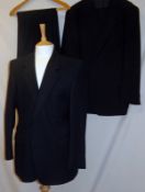 A Navy Blue chalk stripe Vintage Gentleman’s Suit bearing label Dunn & Co comprising of: Jacket