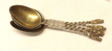 A set of for Victorian Apostle Teaspoons of typical form with twisted stems, London 1882, weight