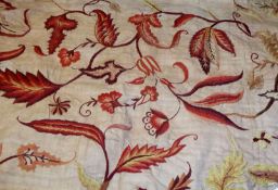 A 19th Century Long Crewelwork Panel, formerly part of a bed hanging set, features a design of