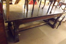 A 19th Century Oak Refectory Table, probably with later top, raised on heavy moulded baluster