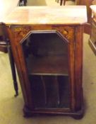 A small Victorian Walnut Veneered and Inlaid Music Cabinet, of typical form with single glazed door,