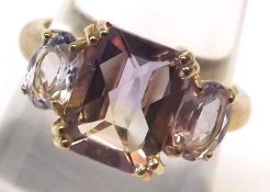 A hallmarked 9ct Gold Ring set with Ametrine and Amethyst